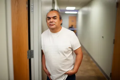 Volunteer and community organizer Eddie Garcia stands for a portrait at a medical clinic provided free of charge to local residents in Hope, Ark. on Sept. 7, 2023. Photo by Rory Doyle.